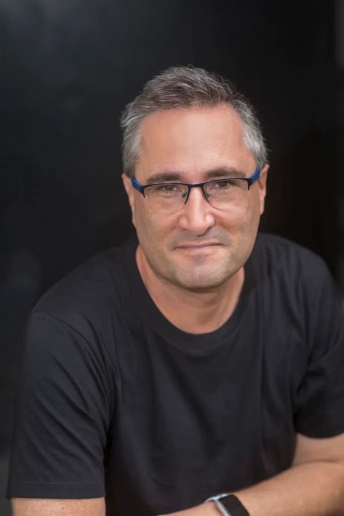Headshot of Myles Lagolago-Craig, CEO, XWP