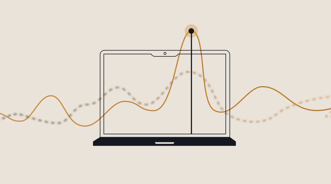 Laptop displaying an analytics dashboard with a highlighted peak, representing digital solution performance.