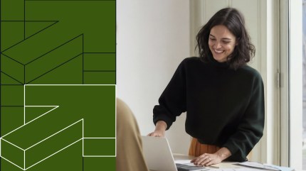 Enterprise content analytics visual showing a professional using a laptop alongside geometric data structures, representing measuring content performance at scale.
