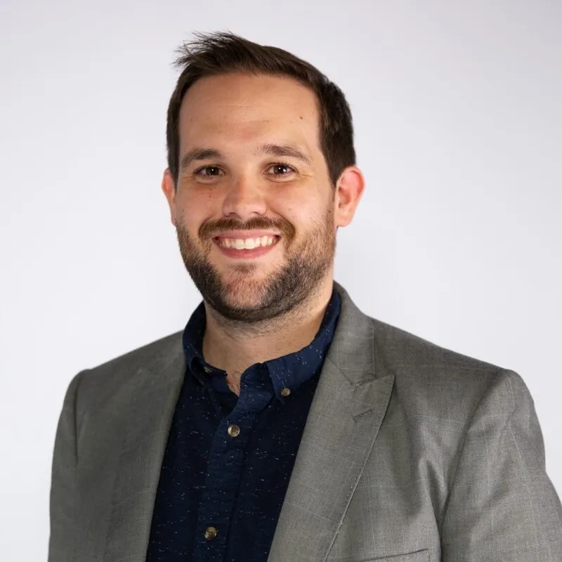 Headshot of Kyle Davis, Director of Marketing and Communications, Studio Science