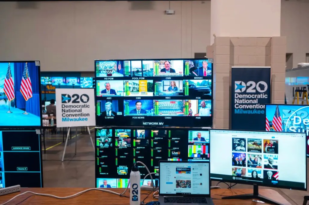 Multiple monitors showcasing different speakers at the Democratic National Convention held in Milwaukee.