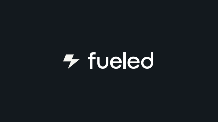 White Fueled logo on a black background, framed by thin gold lines.