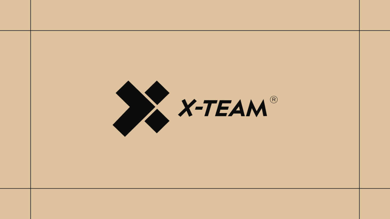 Black X-Team logo on a gold background, framed by thin black lines.