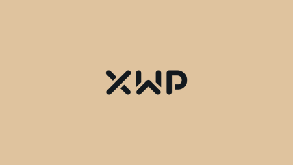 Black XWP logo on a gold background, framed by thin black lines.