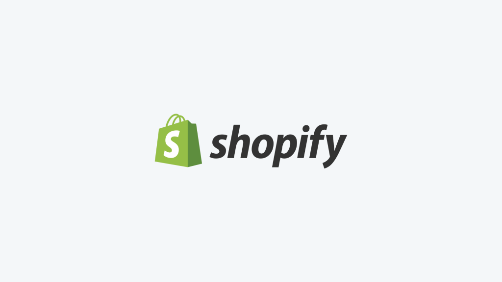 Shopify logo with a green shopping bag icon and the word shopify in black text.